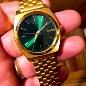 Nixon goldtone mens quartz wristwatch